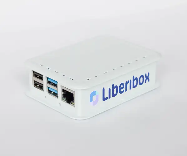White Liberibox internet security box with its logo, USB ports, and network port